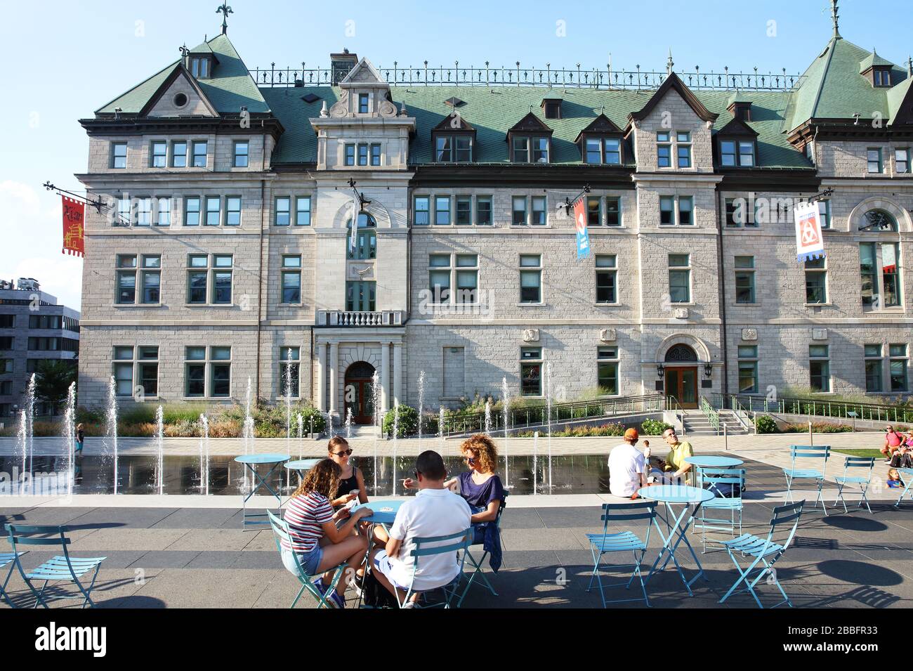 Rooftop garden (above a parking garage) adjacent to Quebec City Hall (in the background) and featuring terraces, dancing water fountains, green spaces. Upper Town, Quebec City, Province of Quebec, Canada Stock Photo