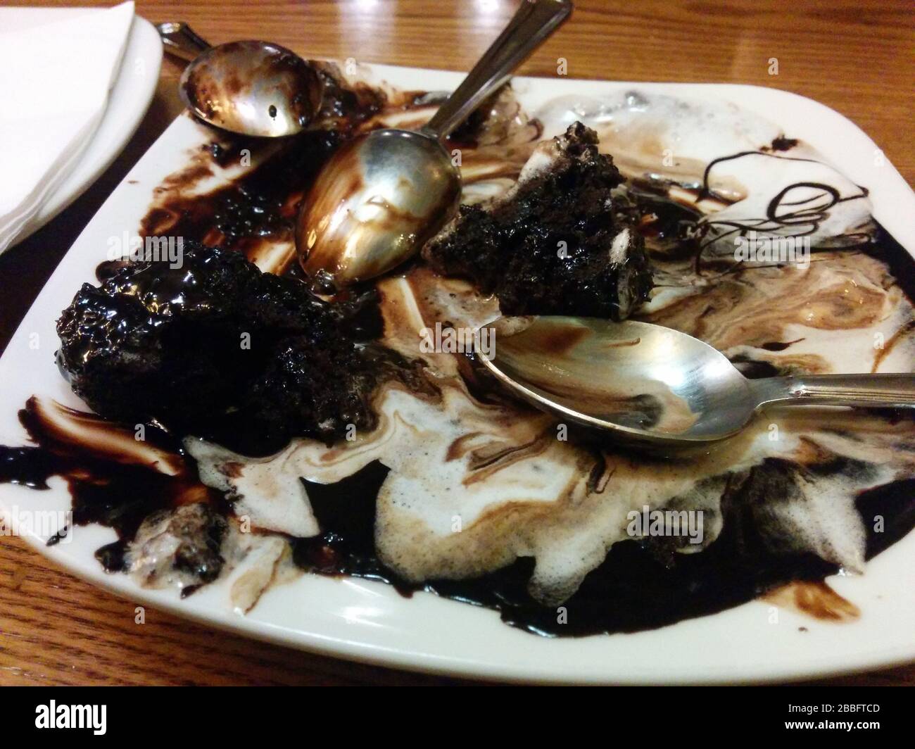 chocolate fudge brownies with vanilla ice cream Stock Photo Alamy
