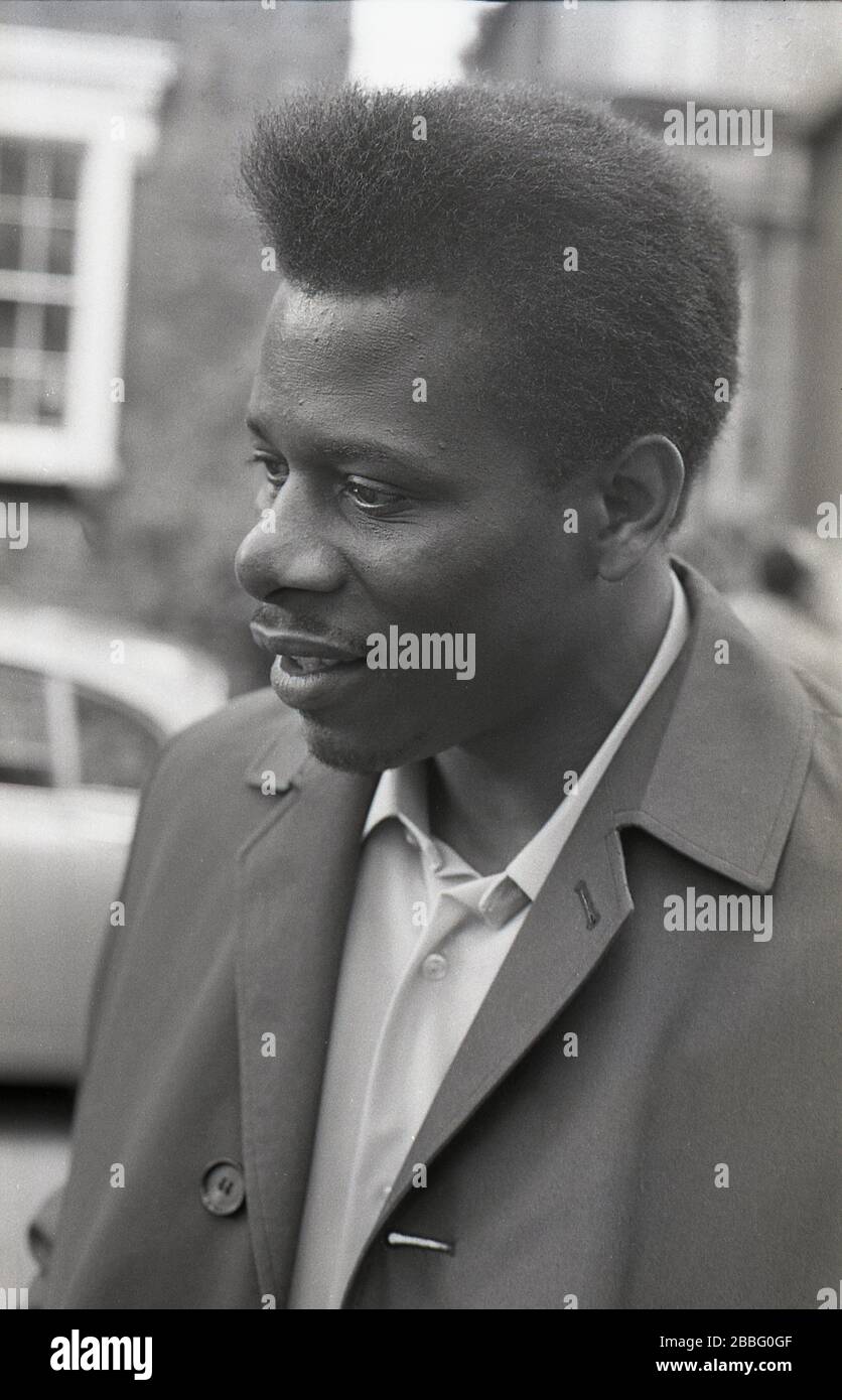 1970s, historical, a caribbean worker outside the offices of the Amalgamated Engineering Union (AEU), South London, England, UK. Stock Photo