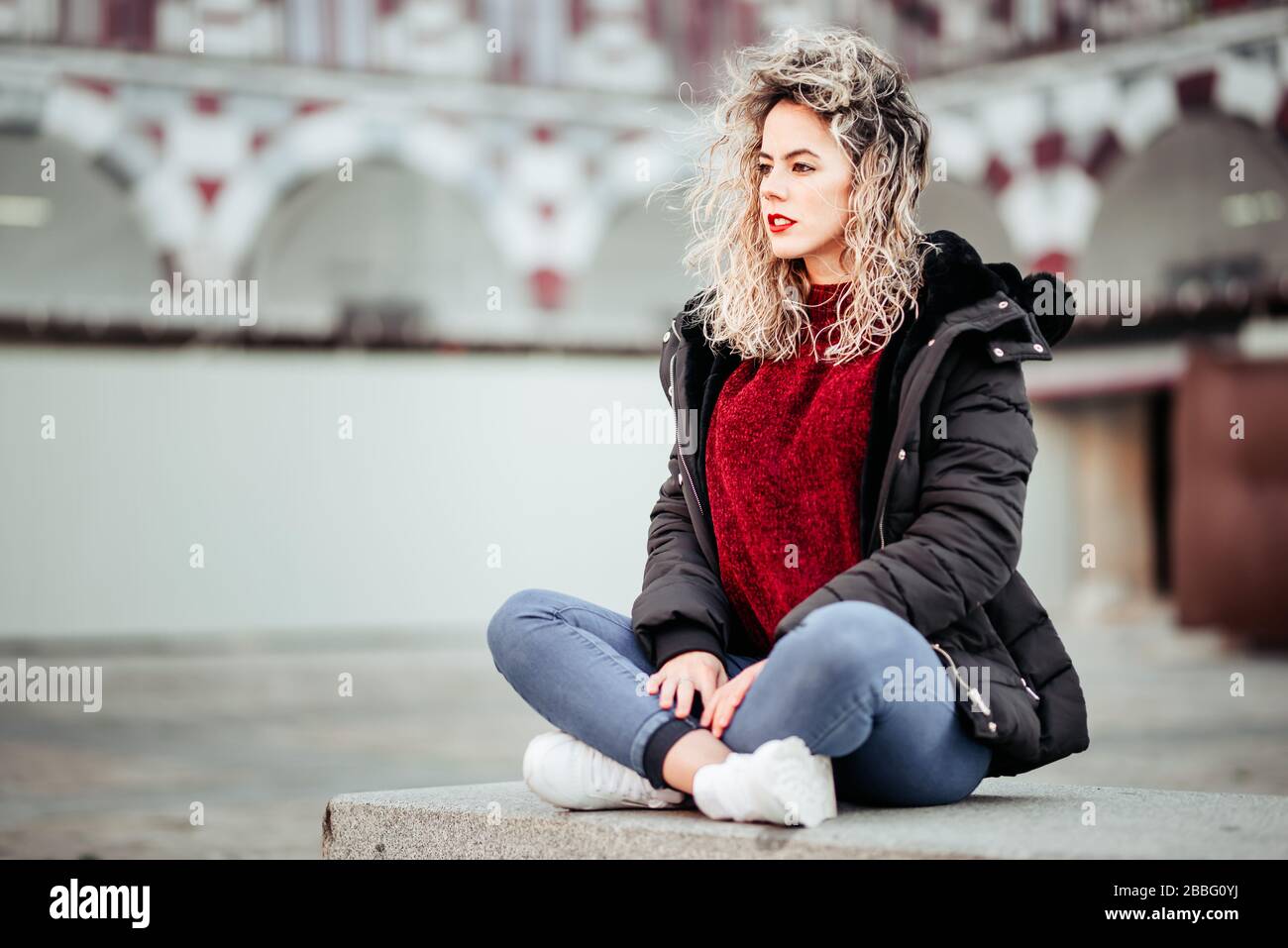 Woman blonde curly hair hi-res stock photography and images - Alamy