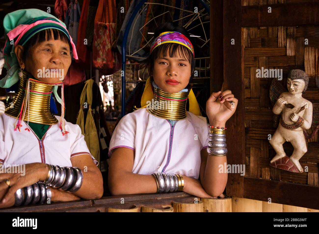 INLE LAKE, MYANMAR - May 19, 2019: Portrait of two Kayan Lahwi tribe women with neck rings. Long neck woman. Stock Photo