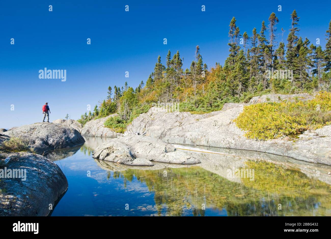 hiking along shoreline, Pukaskwa National Park, Lake Superior, Ontario, Canada Stock Photo