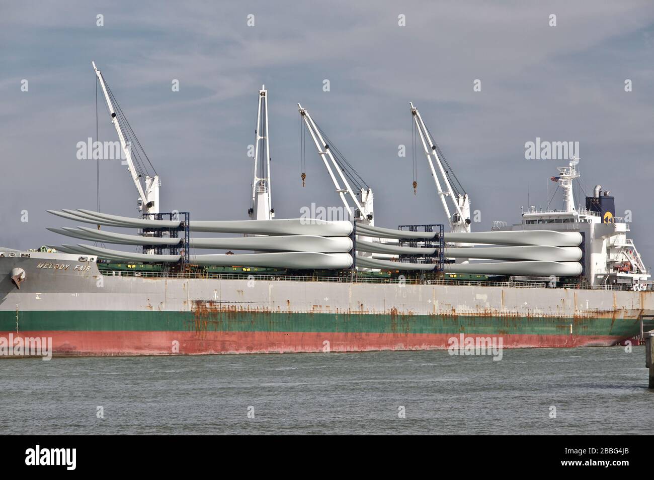 Giant Wind Turbine Propeller Blades, preparing to offload  from freighter,   Port Aransas, Texas. Stock Photo