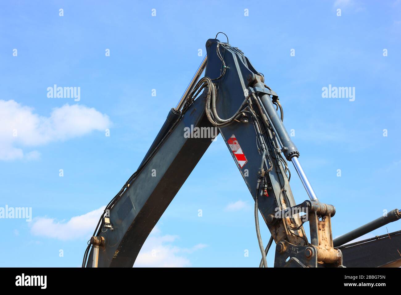 Civil engineering, construction machinery, arm of a hydraulic excavator with hydraulic lines  /  Bauwesen, Baumaschinen, Arm eines Hydraulikbagger mit Stock Photo