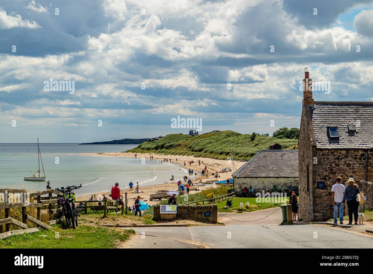 A summer's day on the beach at Low Newton-by-the-Sea, Northumberland, UK. August 2018. Stock Photo
