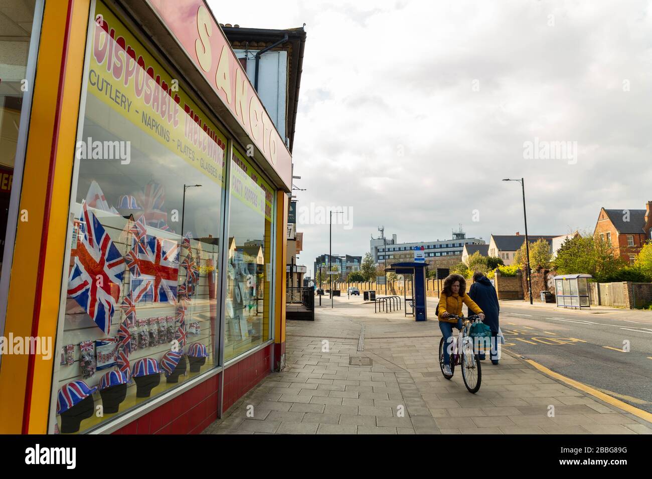 Southend-on-Sea, UK. 31st Mar, 2020. Union flags in a closed fancy dress shop on a road leading into Southend town center. Penelope Barritt/Alamy Live News Stock Photo