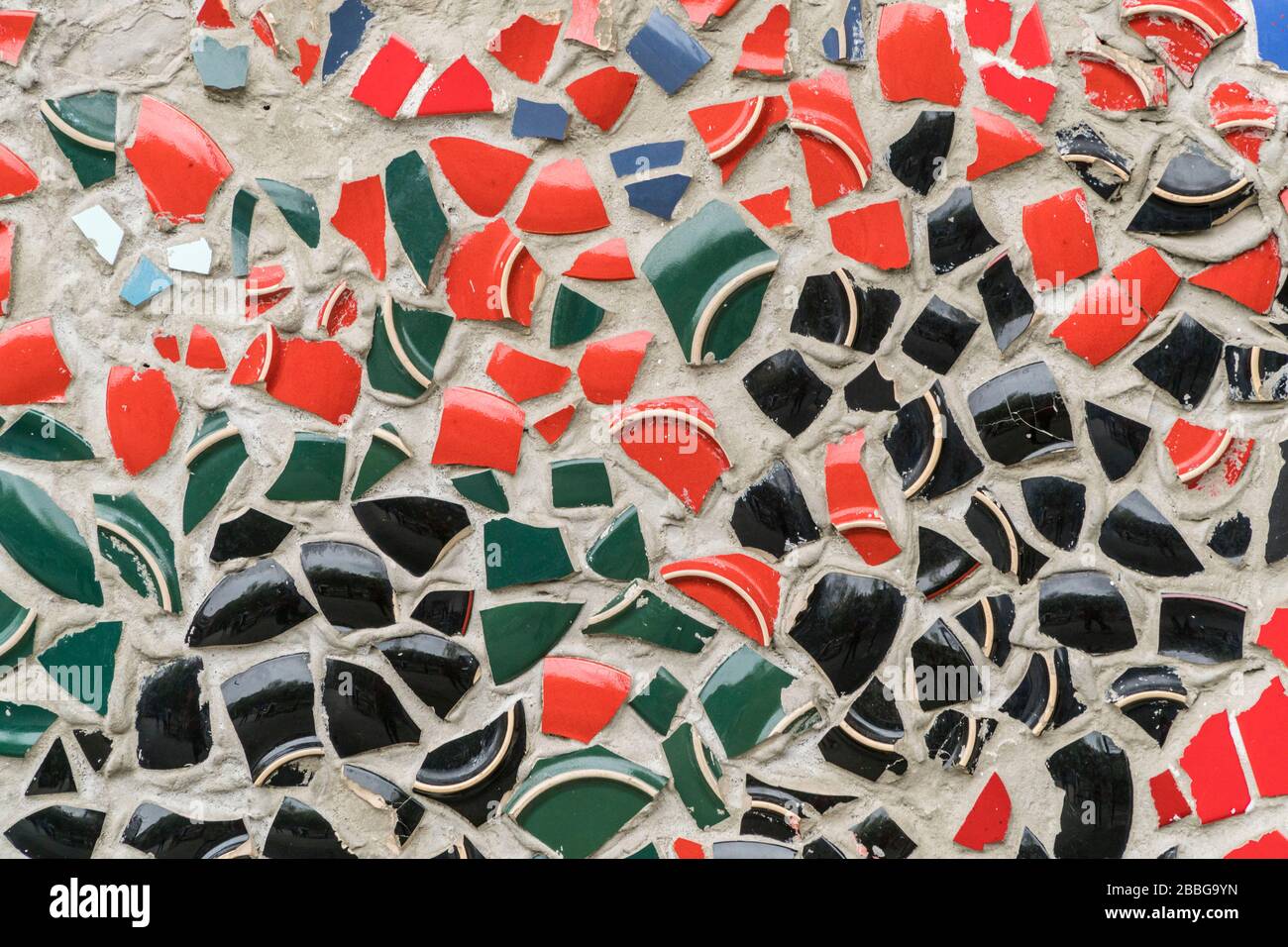 wall covered with broken ceramic pieces as a background Stock Photo Alamy