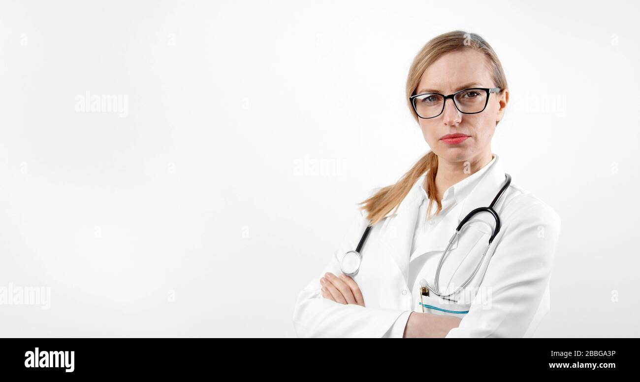 Middle aged woman arms crossed hi-res stock photography and images - Alamy