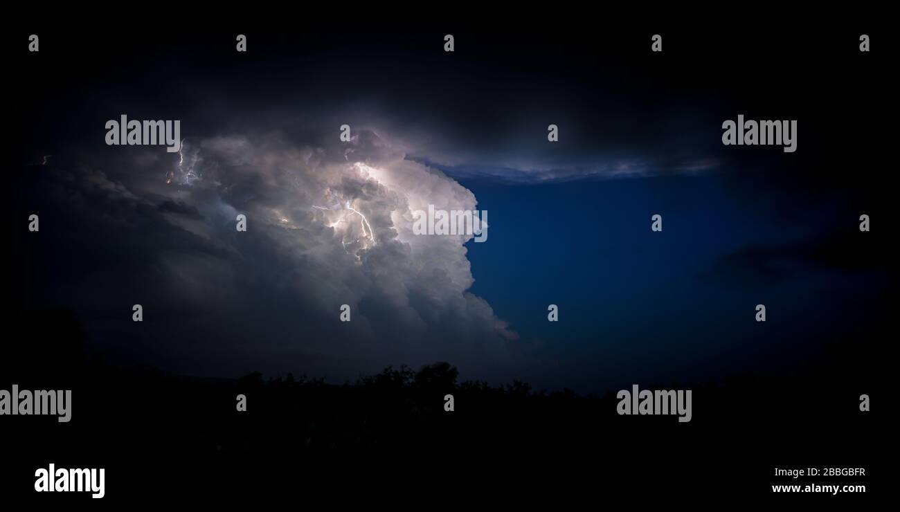 Storm with cloud to cloud lightning flashing in Texas United States Stock Photo