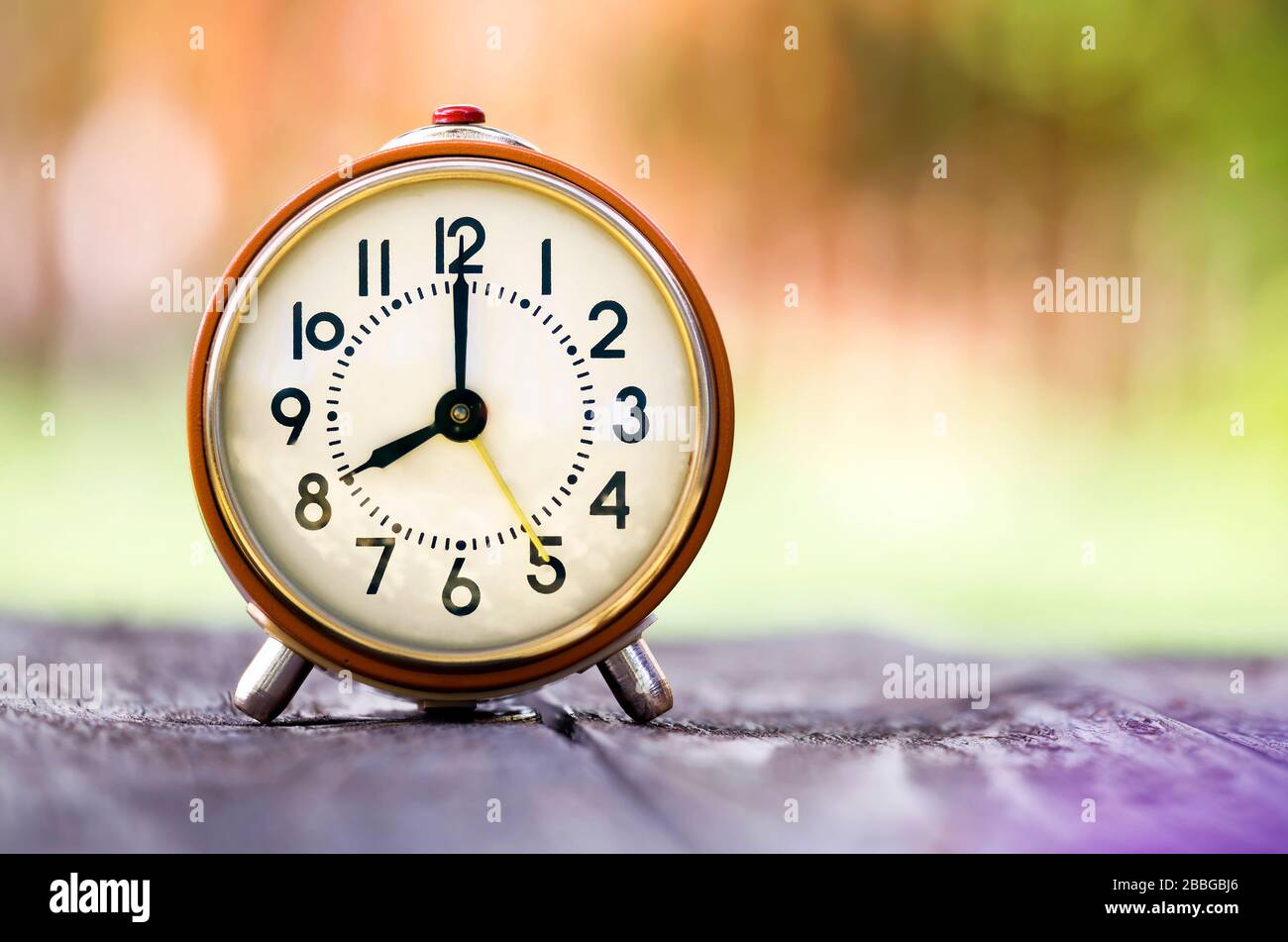 Daylight savings time, spring forward concept retro alarm clock Stock