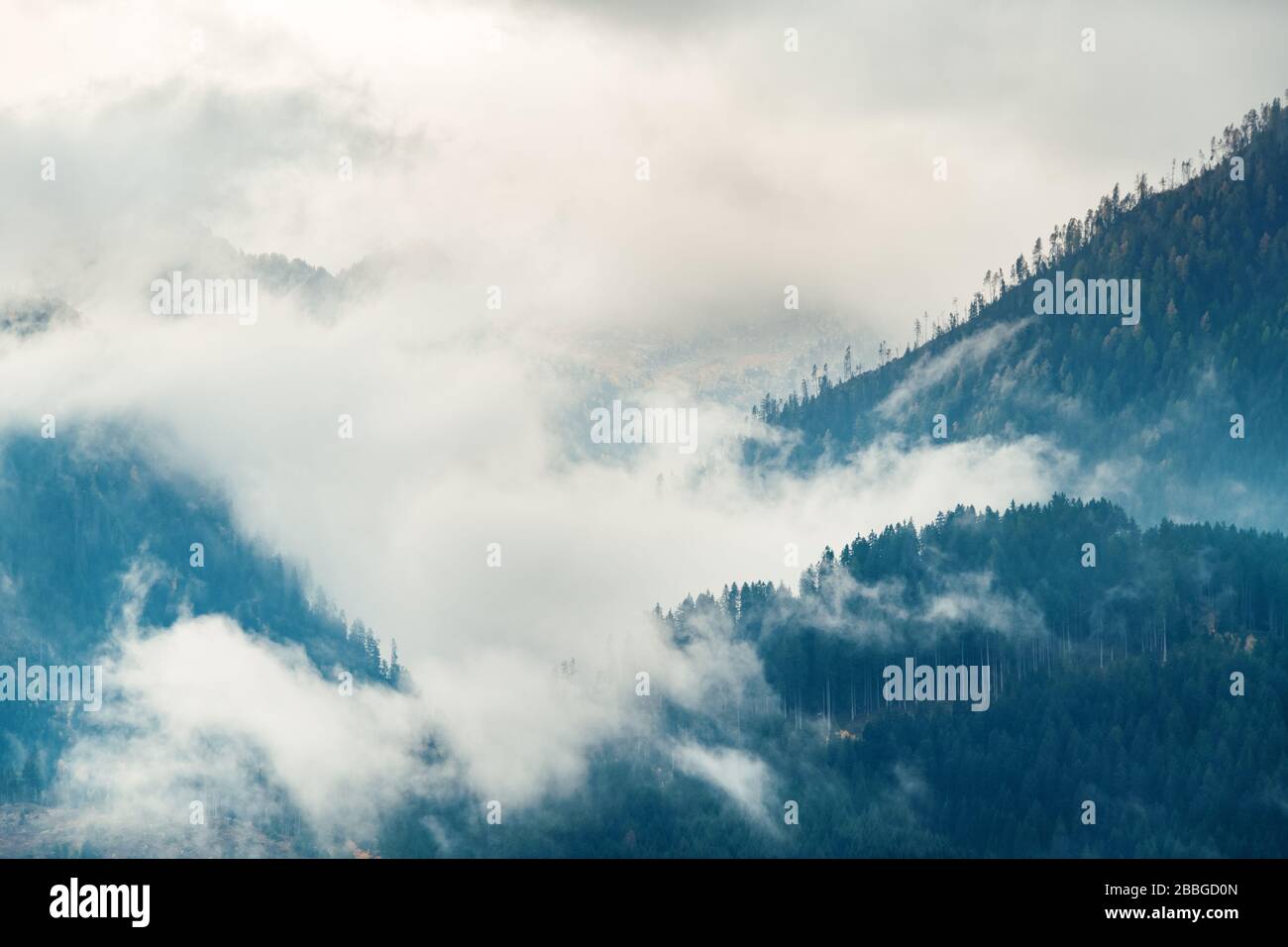 Dolomites natural landcape in fog in North Italy Stock Photo - Alamy