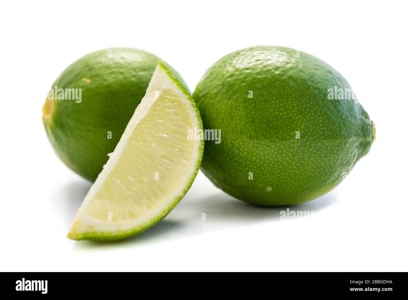Limes isolated on a white background Stock Photo