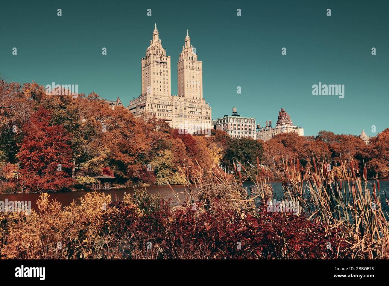 Central Park Autumn and buildings in midtown Manhattan New York City ...
