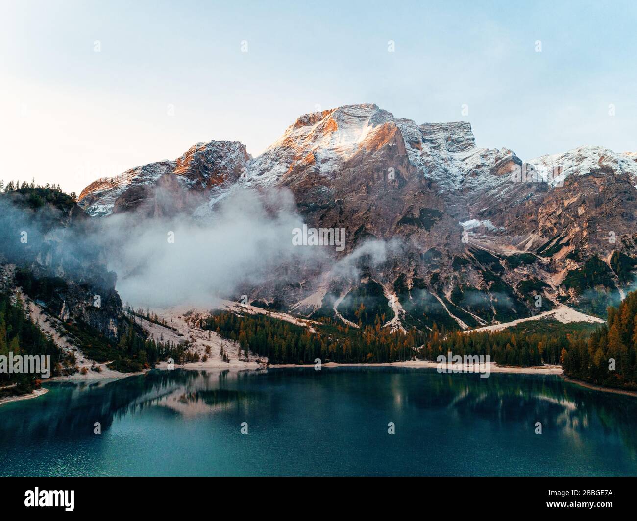 Dolomites lake mountain fog in North Italy Stock Photo - Alamy