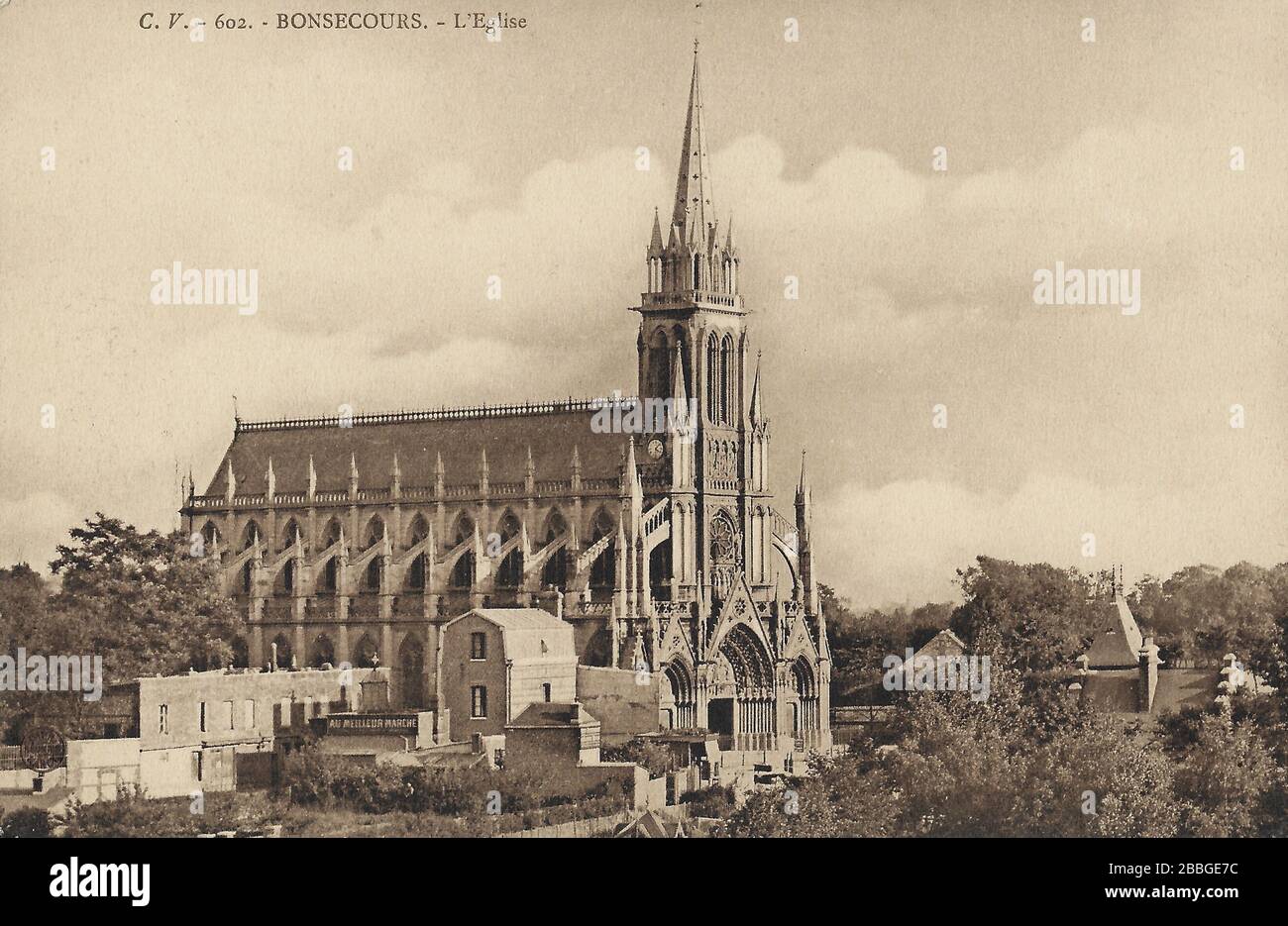 Postcard from around 1910 of The Basilique Notre-Dame de Bonsecours (Basilica of Our Lady of Refuge) is a Gothic Revival basilica in Bonsecours near R Stock Photo
