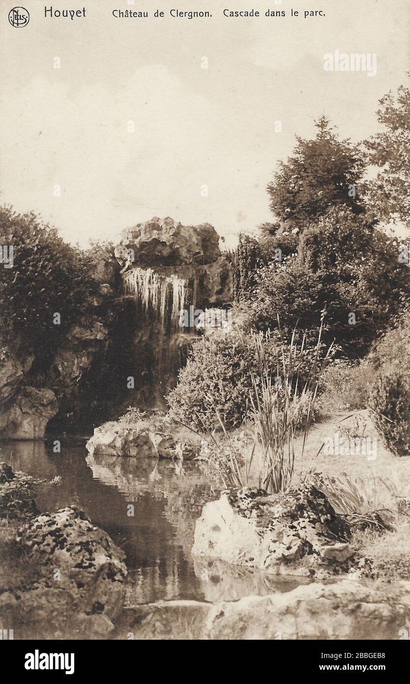 Postcard from 1920 showing the waterfall in the park garden of Ciergnon Castle, or the Royal Castle of Ciergnon (Château Royal de Ciergnon; Koninklijk Stock Photo