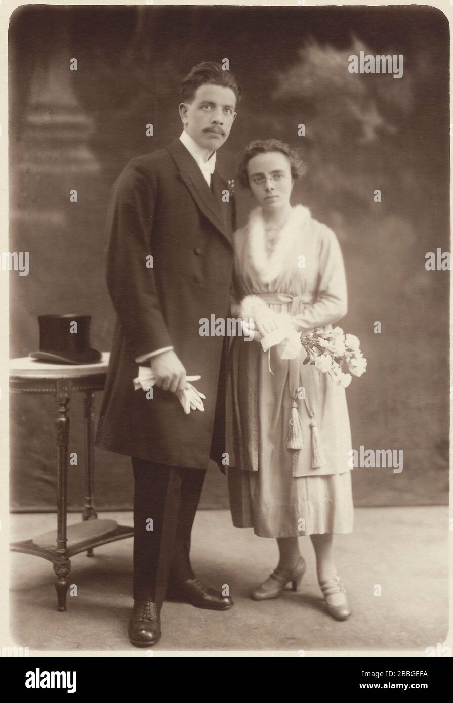 Wedding photo from a young couple in 1921 in the photographers photostudio in Antwerp, Belgium Stock Photo
