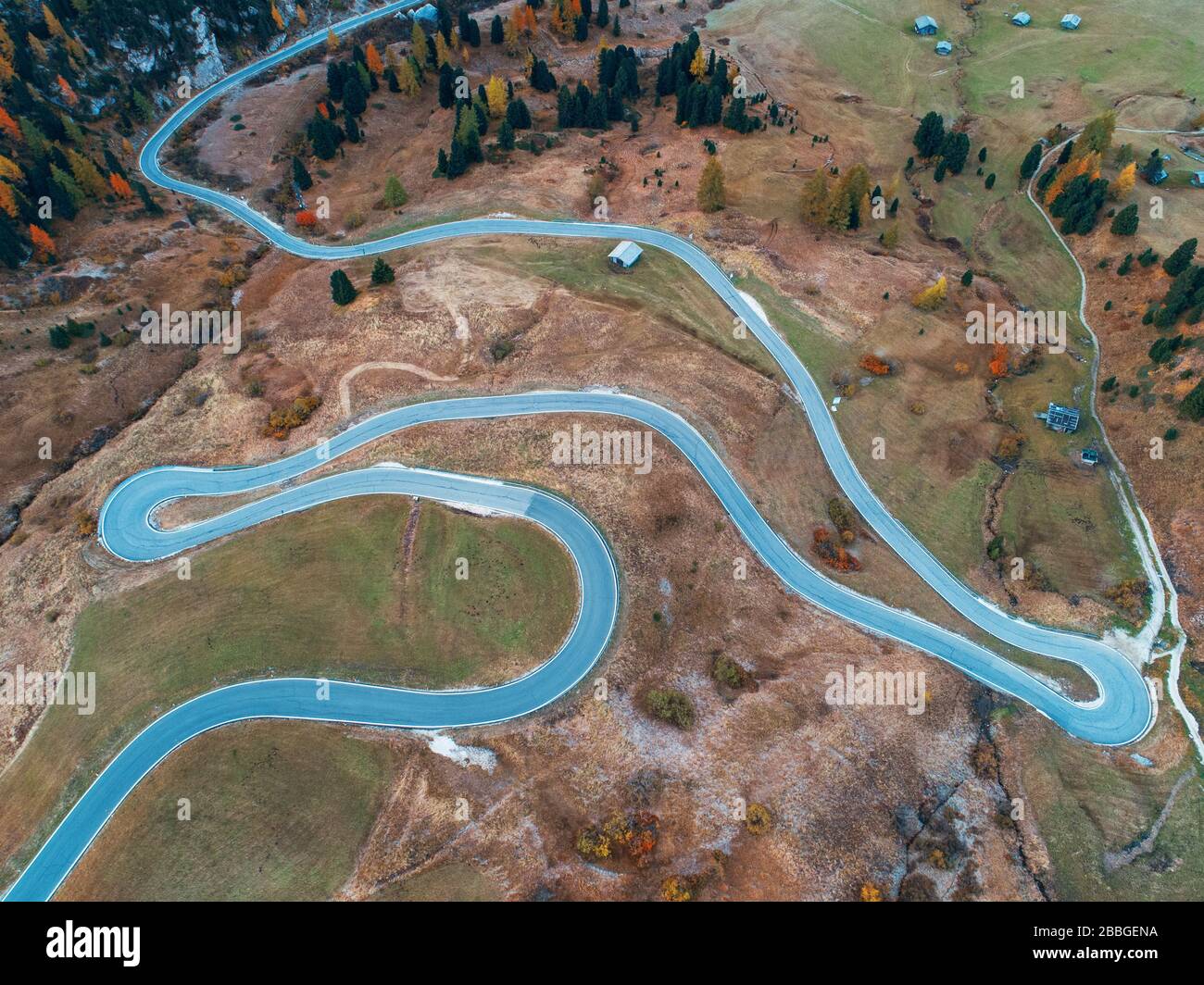 Dolomites winding road aerial view in North Italy Stock Photo - Alamy