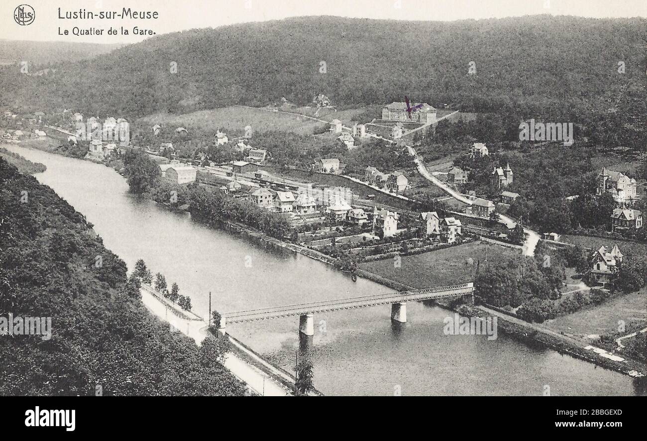 Postcard from 1954 showing Lustin-sur-Meuse, Le Quartier de la  gare, railway station along the Meuse river. Belgium Stock Photo