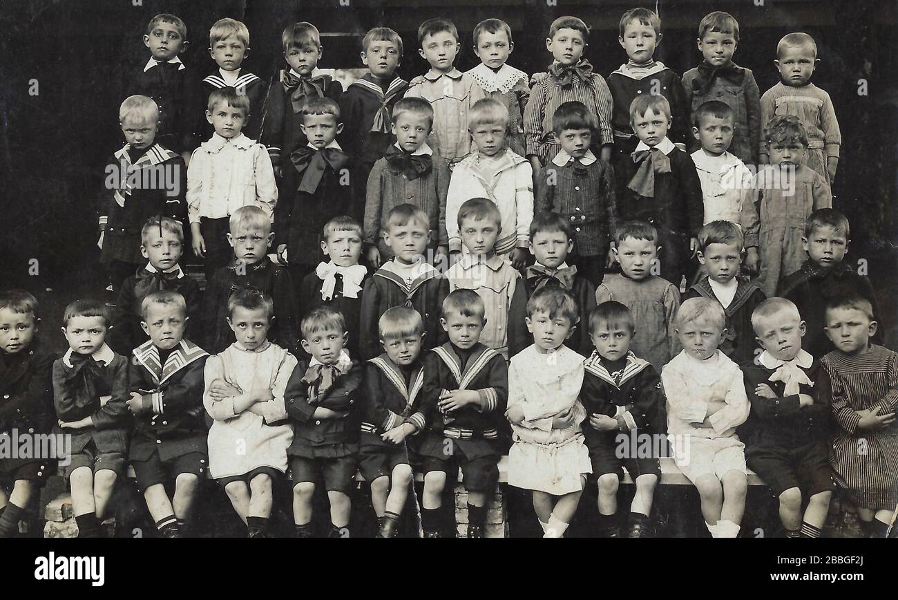 A 1910-1920 shoolphoto showing a class of boys at the age of 5-8 years old, Antwerp, Belgium Stock Photo