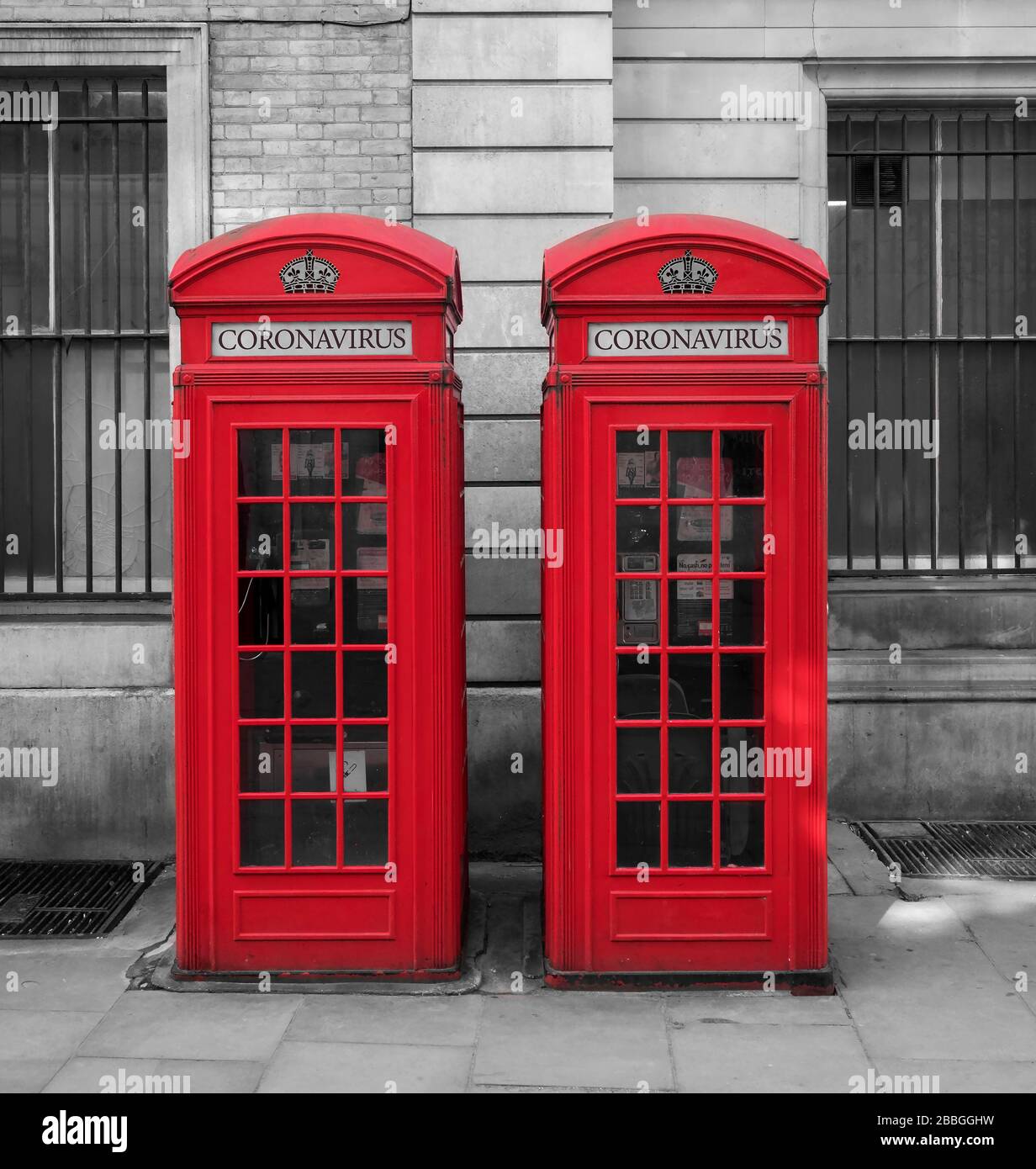 Coronavirus or Covid 19 Illustration on British Red Telephone Boxes, London, England, UK Stock Photo