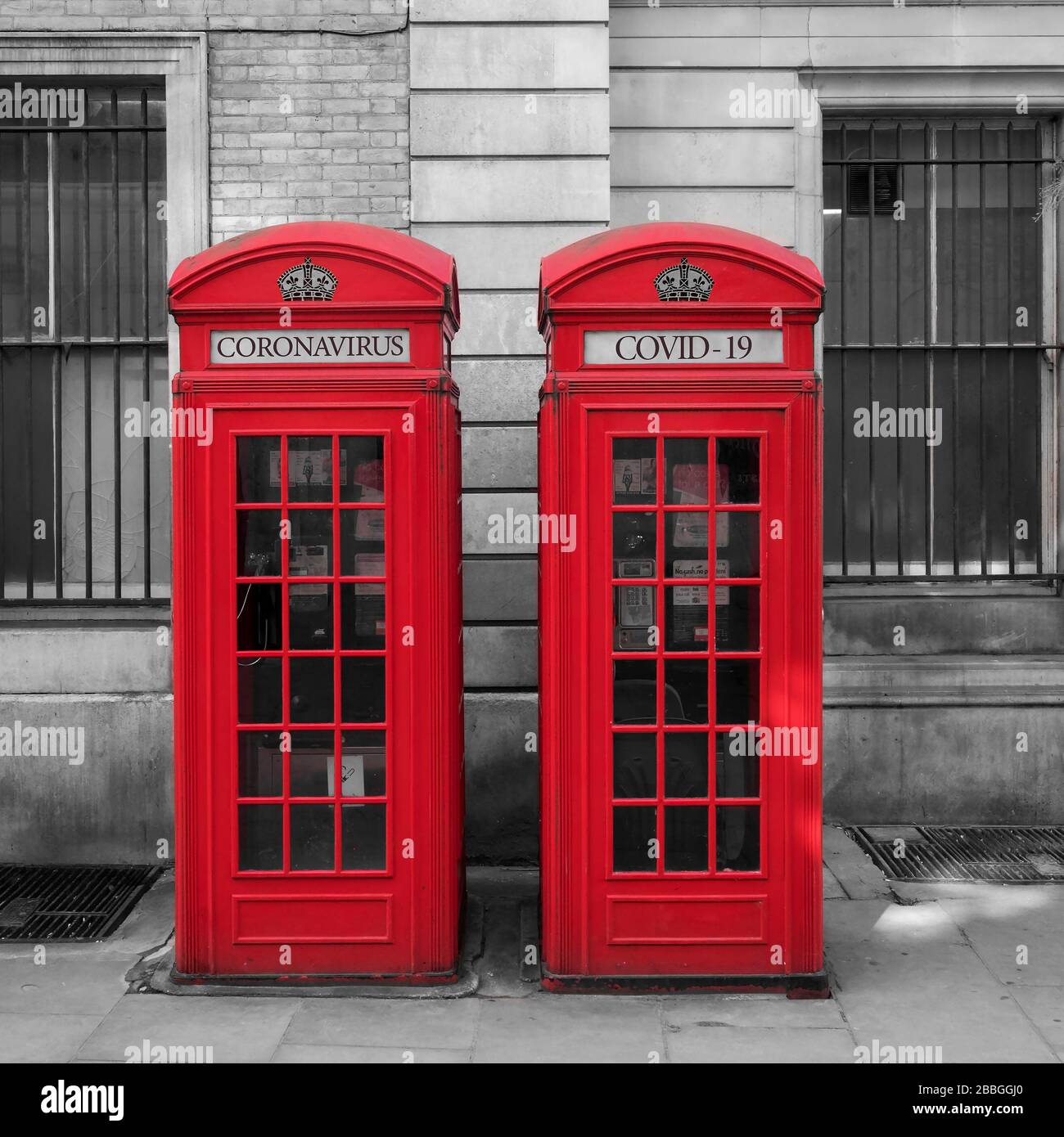 Coronavirus or Covid 19 Illustration on British Red Telephone Boxes, London, England, UK Stock Photo