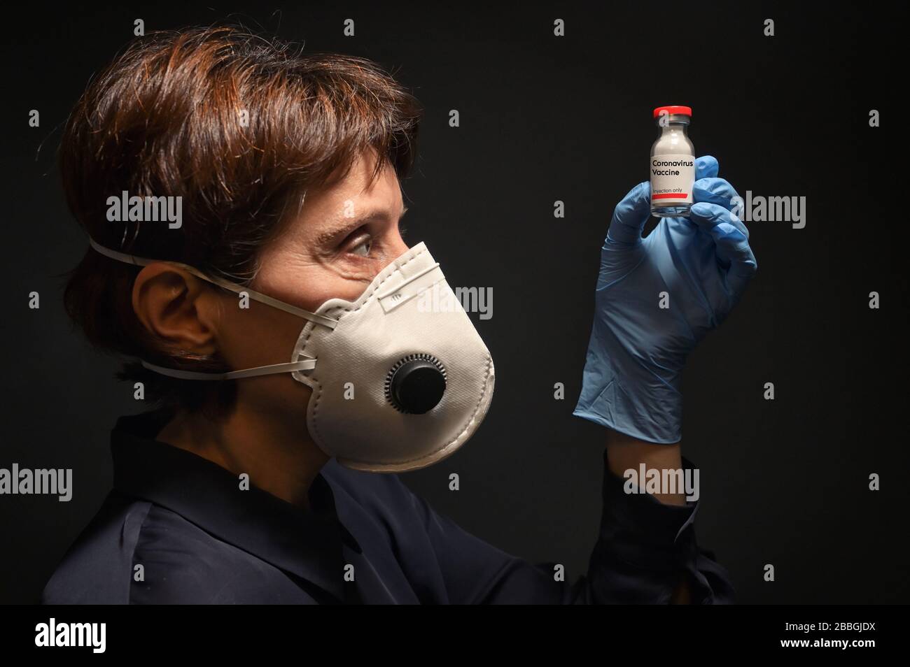 Woman Wearing Medical Protective Virus Mask and Vaccine Stock Photo