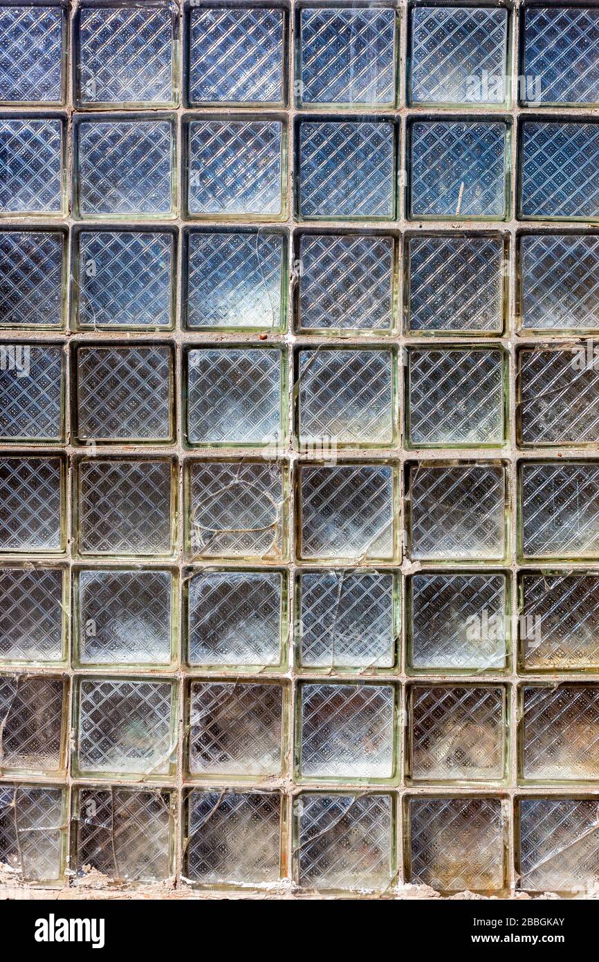 Old grunge glass blocks wall as background texture Stock Photo