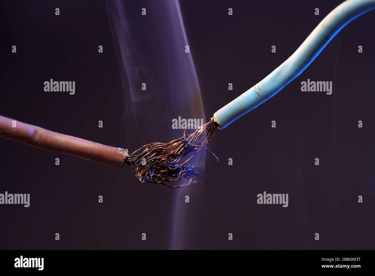 Electric wires with smoke photographed in the studio Stock Photo Alamy