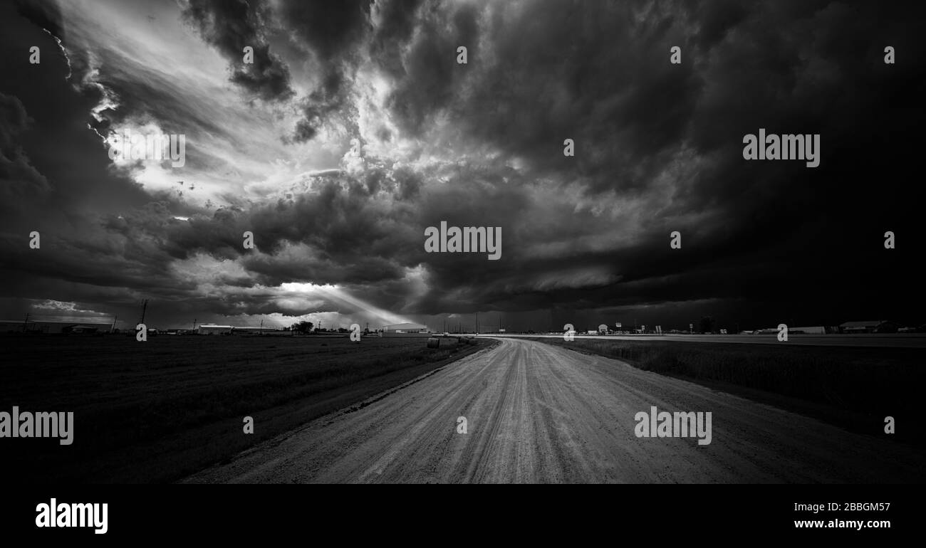 Black and white landscape with road and clouds hi-res stock photography ...