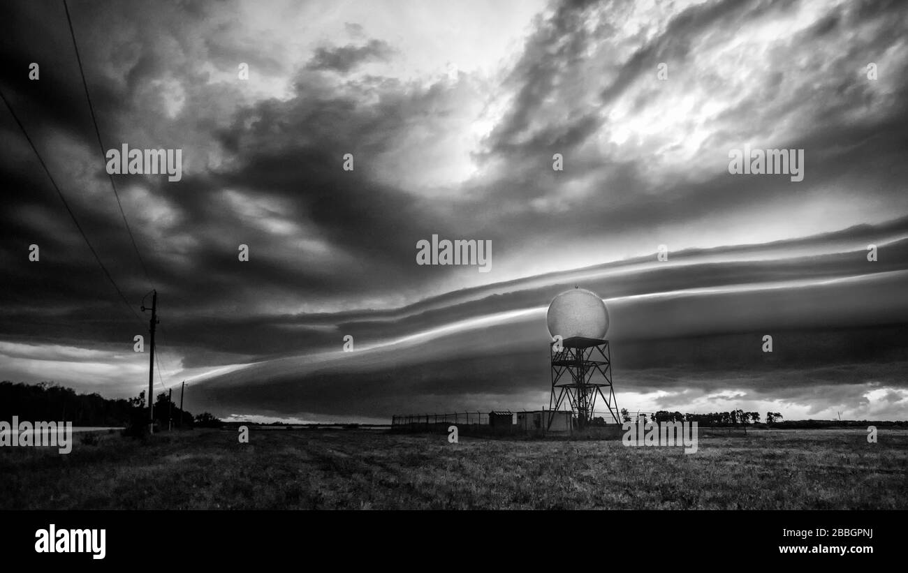 Black and white shelf cloud over radar station in southern Manitoba, Canada Stock Photo