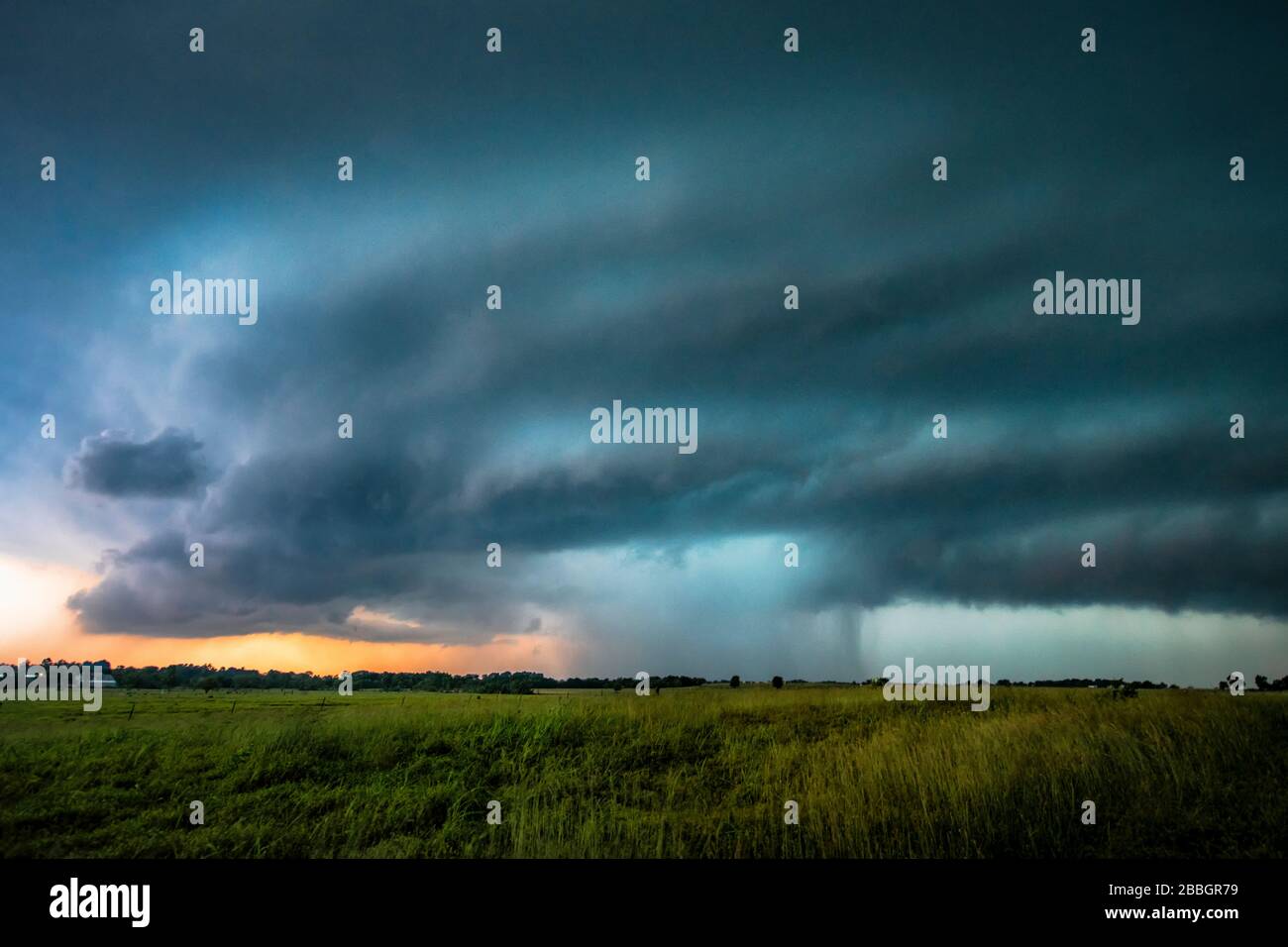 Storm dumping over a field in Oklahoma, United States Stock Photo