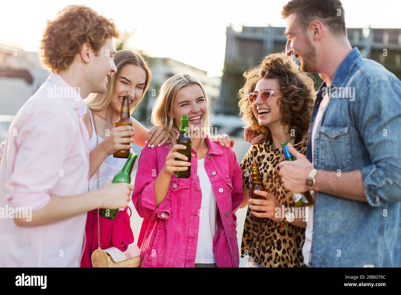 Group of friends having fun outdoors Stock Photo - Alamy