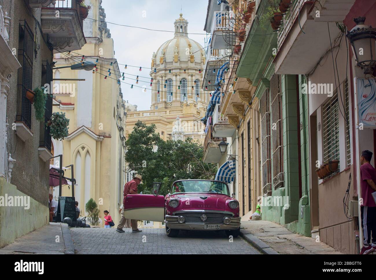 Classic cars and fantastic architecture are part of daily life in Havana, Cuba Stock Photo