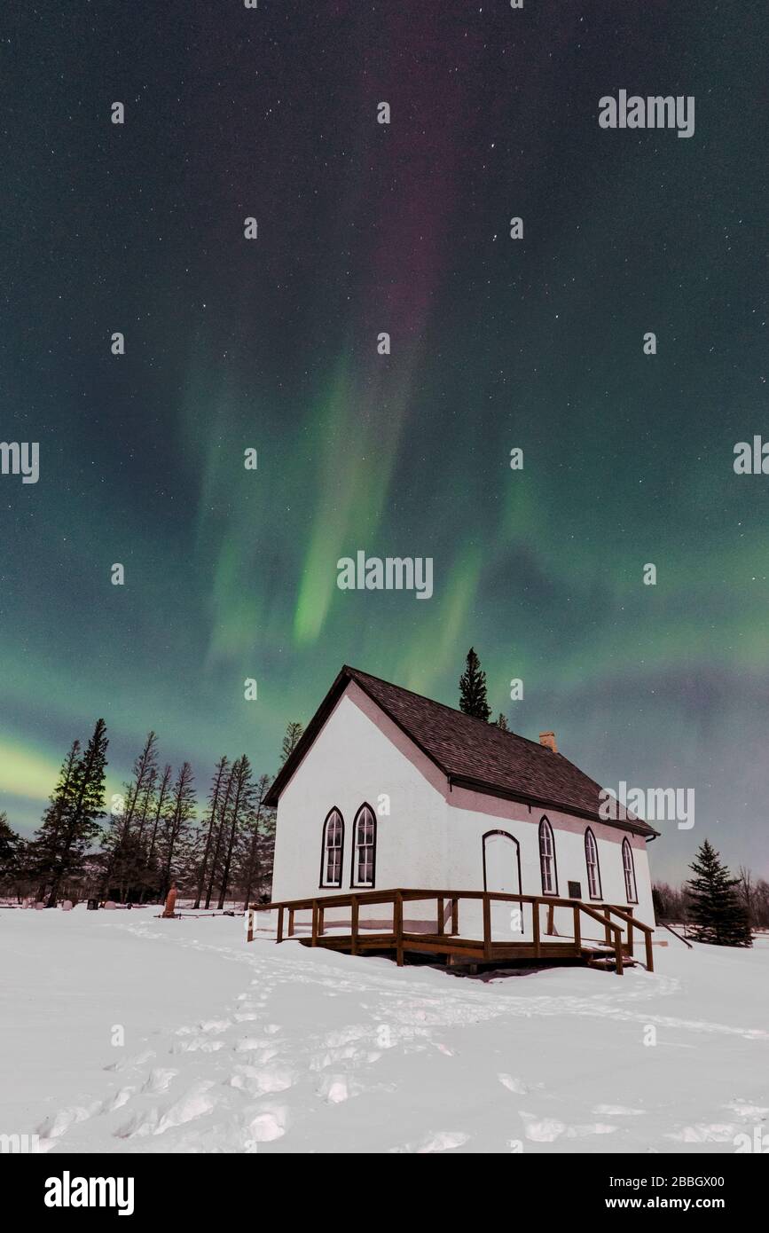 Aurora dancing over old church Stock Photo