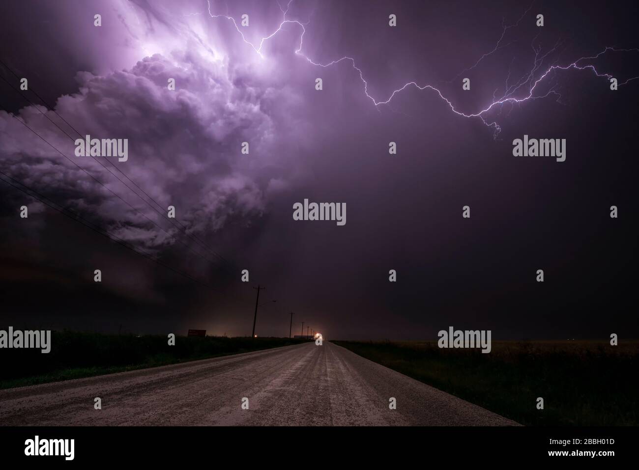 Storm with lightning flashing over gravel road in rural southern Manitoba Canada Stock Photo Alamy