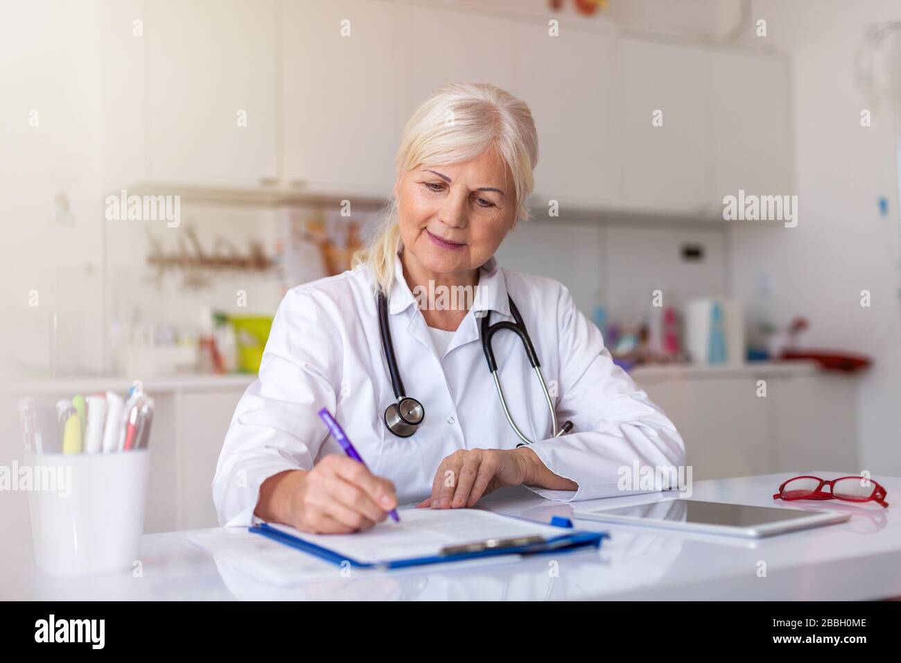 Beautiful mature female doctor hi-res stock photography and images - Alamy