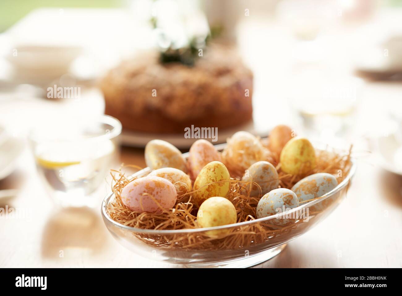 Easter cake and eggs on table Stock Photo