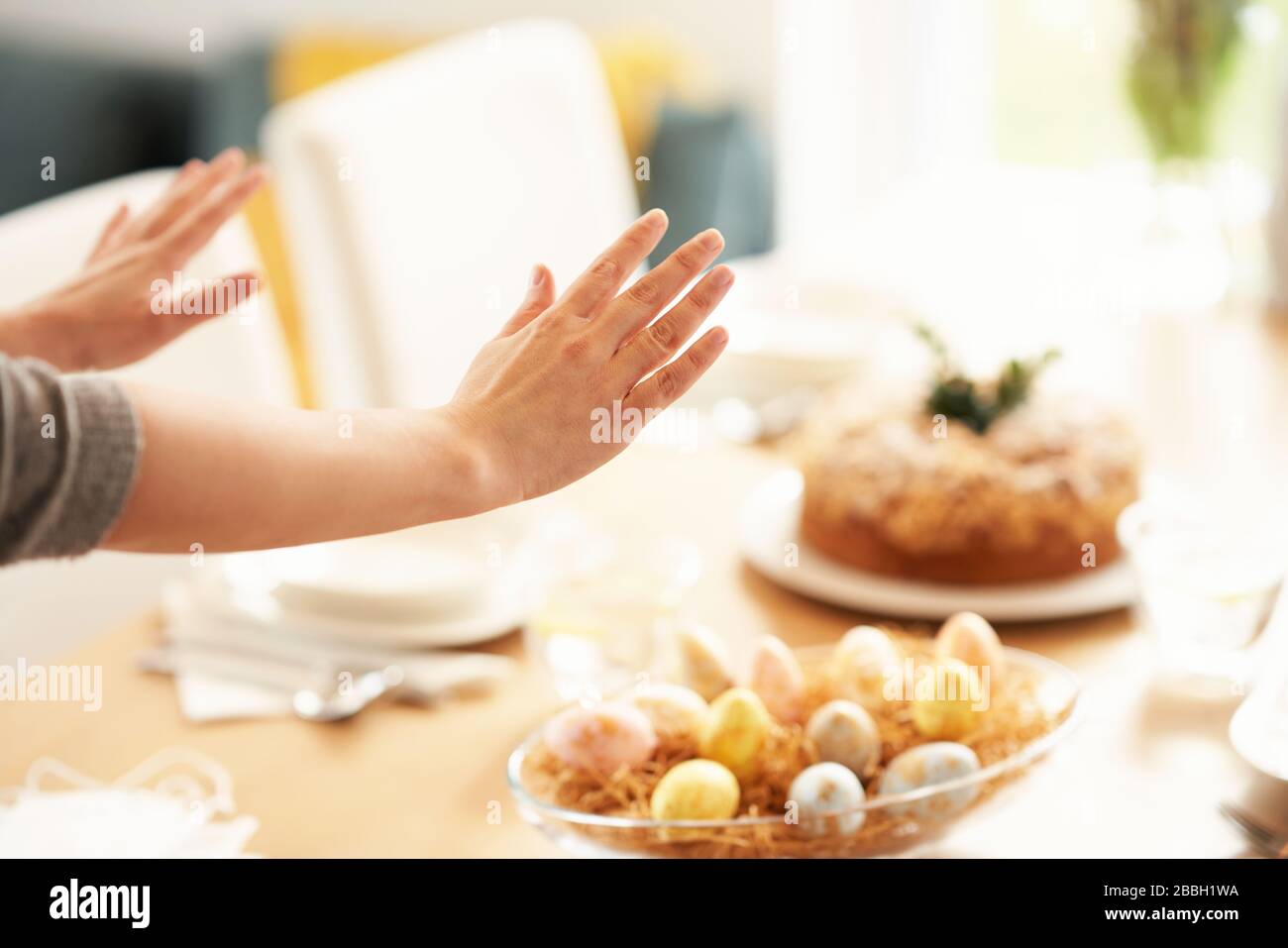 Adult woman blessing Easter food at home Stock Photo Alamy