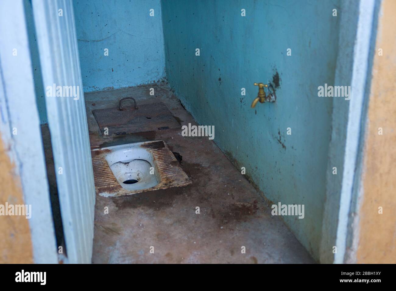Typical pit latrine or drop toilet outhouse, Nairobi, Kenya Stock Photo