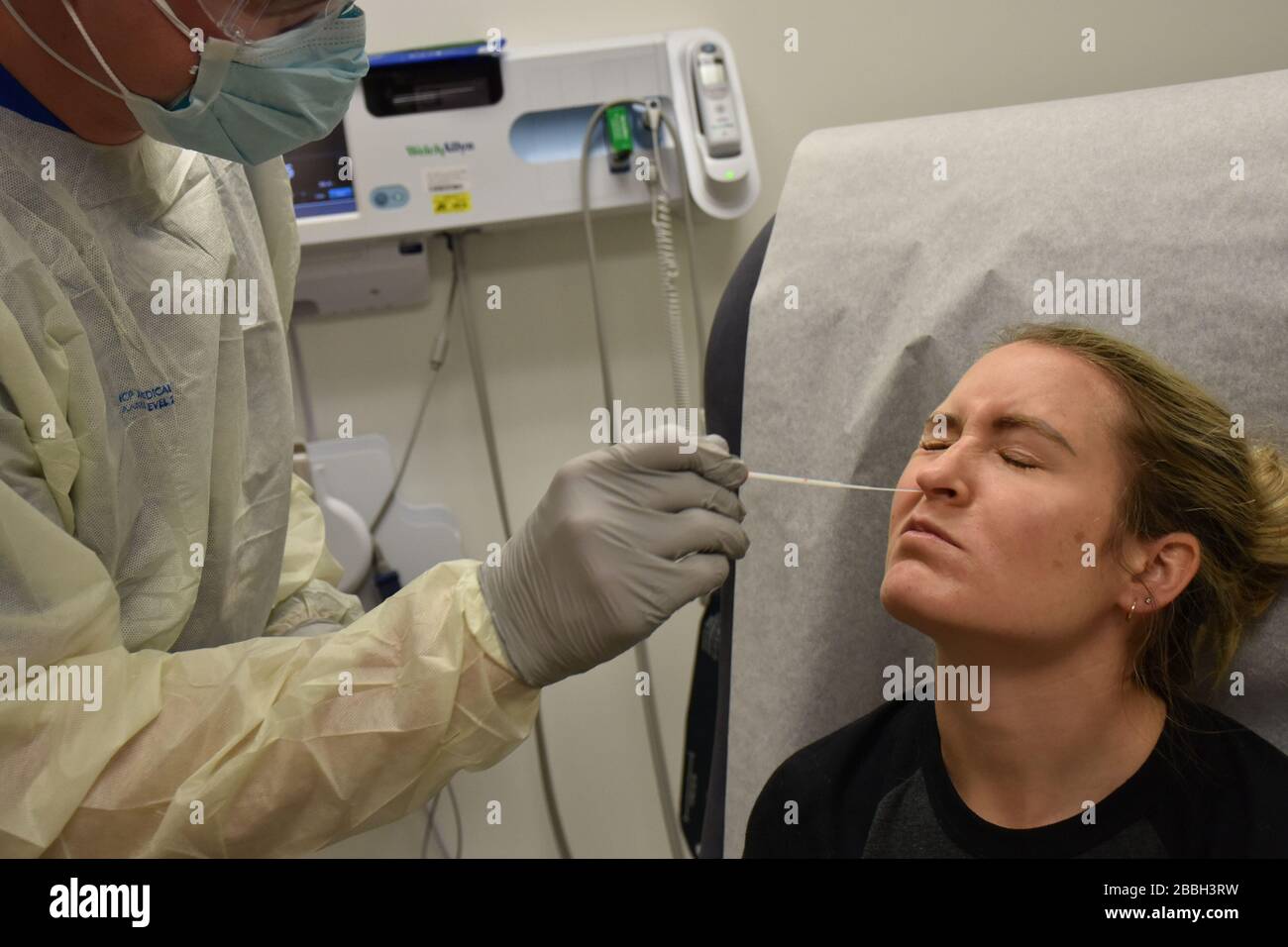 Fort Bragg, United States. 31st Mar, 2020. Pfc. Casey Tebo, a medic at the Womack Army Medical Center Urgent Care Clinic at Fort Bragg, North Carolina, performs a COVID-19 test on a patient on March 26, 2020. Photo by Twana Atkinson/U.S. Army/UPI Credit: UPI/Alamy Live News Stock Photo