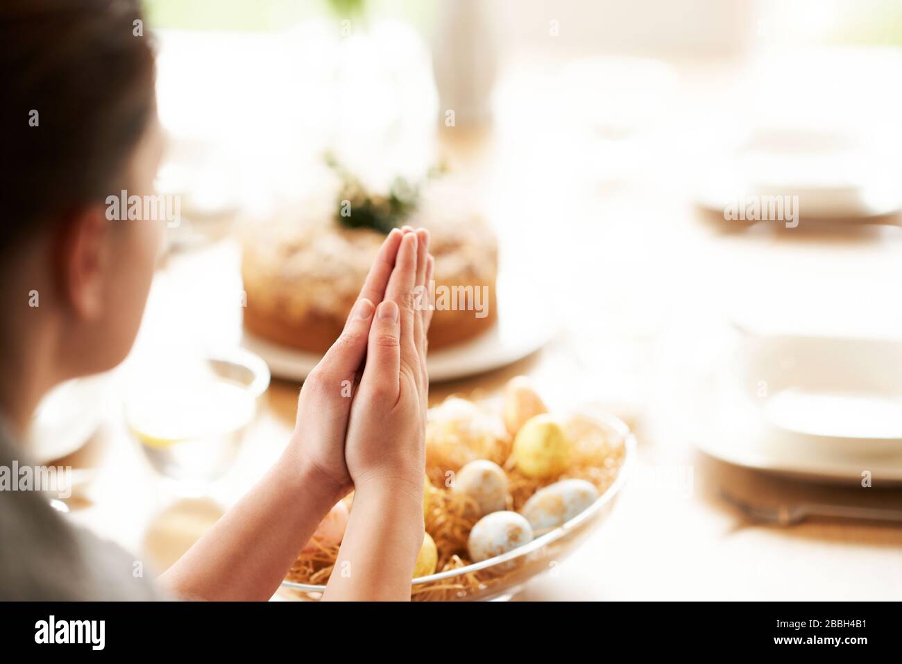 Adult woman blessing Easter food at home Stock Photo Alamy