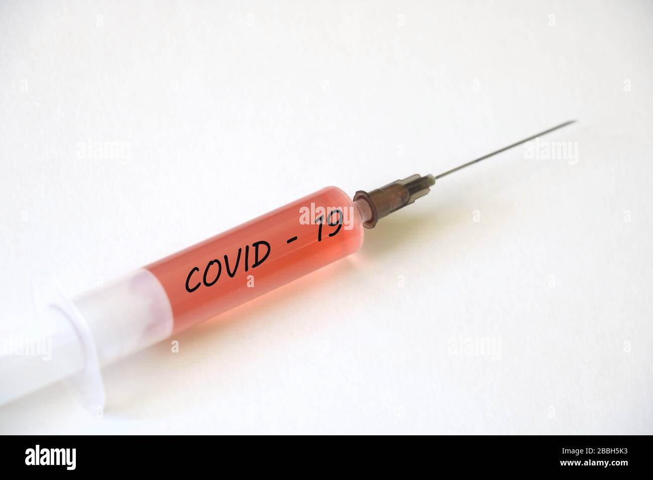Vaccine for coronavirus 2019-nCoV. Photo of vaccine, medical injection and coronavirus. Stop coronavirus Stock Photo