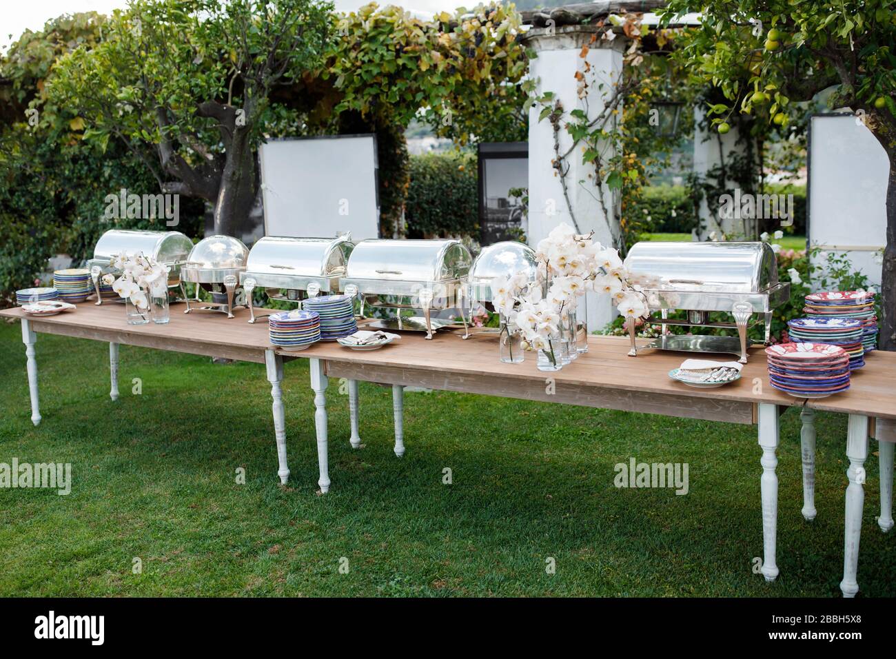 Outdoor Spring Or Summer Casual Garden Party Set Up For Lunch