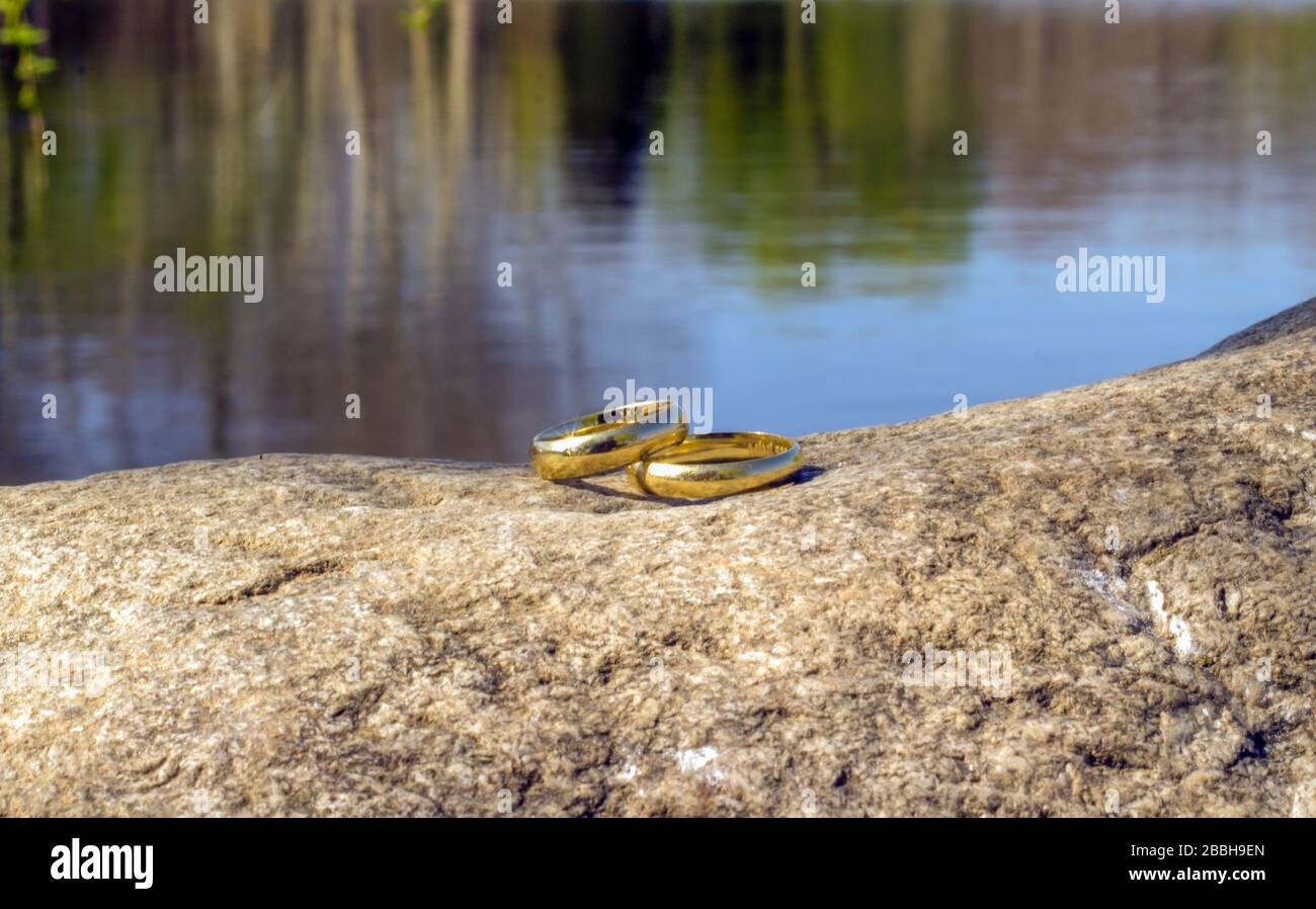 wedding rings of a cute couple. Engagement rings Stock Photo