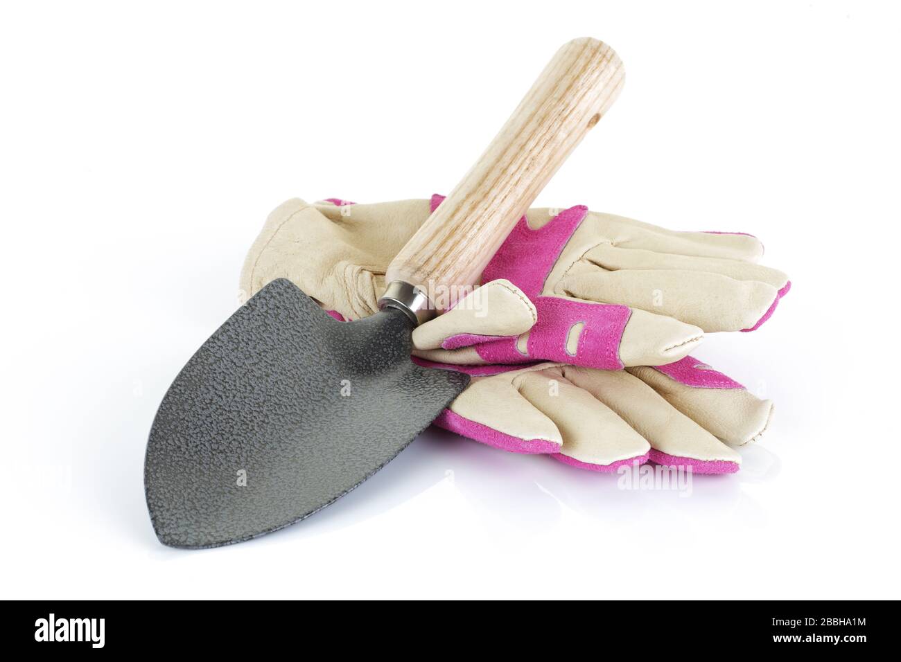 Garden trowel and gloves on a white background Stock Photo