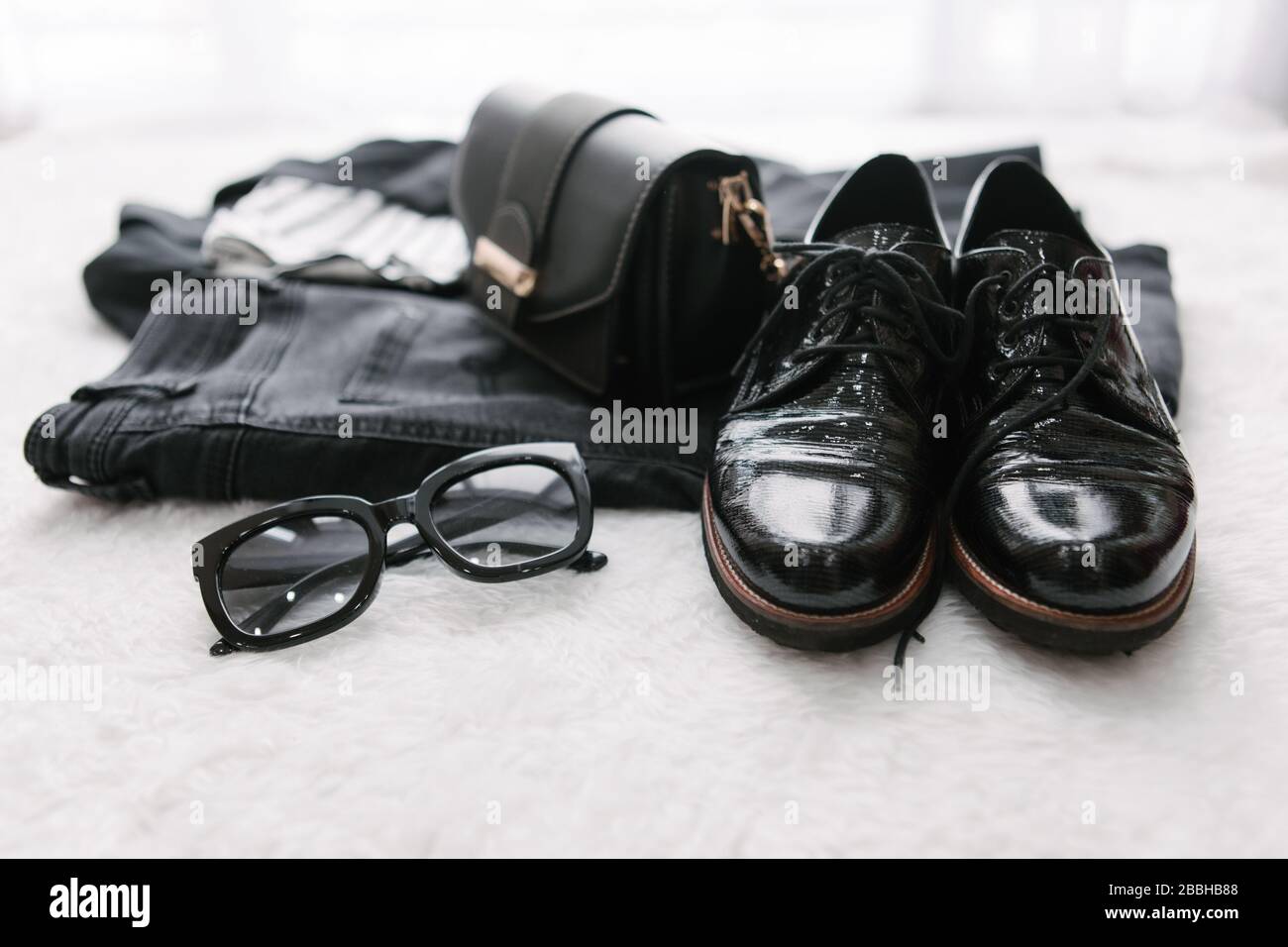 view of woman clothes black and white Stock Photo - Alamy