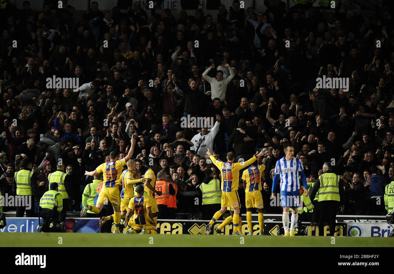 Crystal Palace players celebrate scoring their second goal in front of