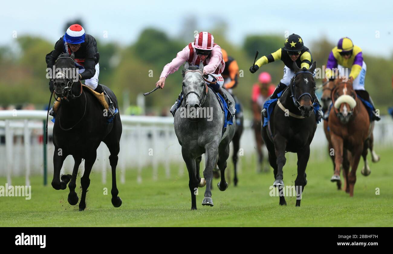 Society Rock ridden by Kieren Fallon (l) beats Lethal Force ridden by Adam Kirby to win The Duke of York Clipper Logistics Stakes Stock Photo