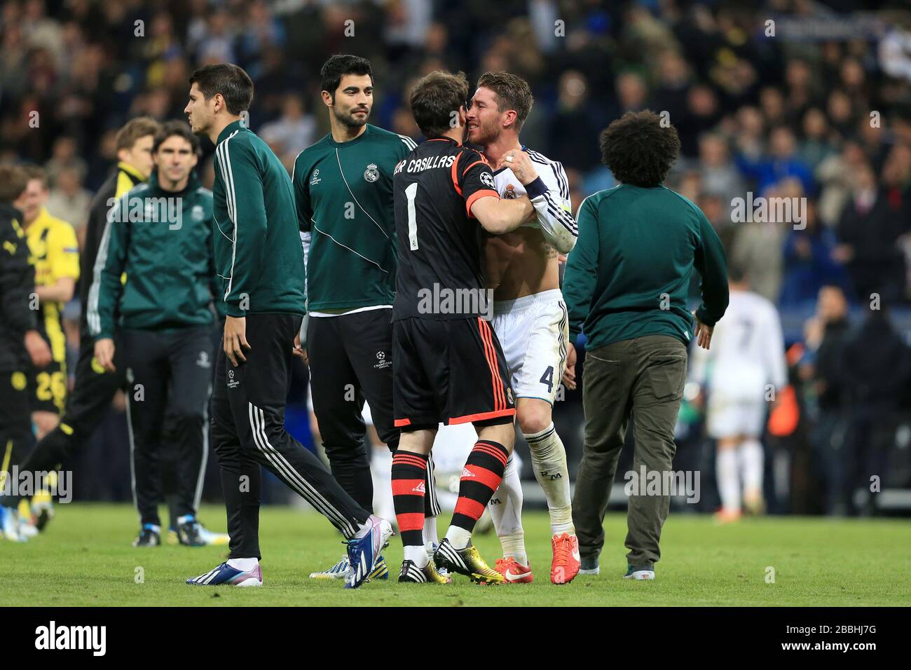Real Madrid goalkeeper Iker Casillas (centre) consoles his tearful team-mate Sergio Ramos (centre right) after their aggregate defeat to Borussia Dortmund Stock Photo